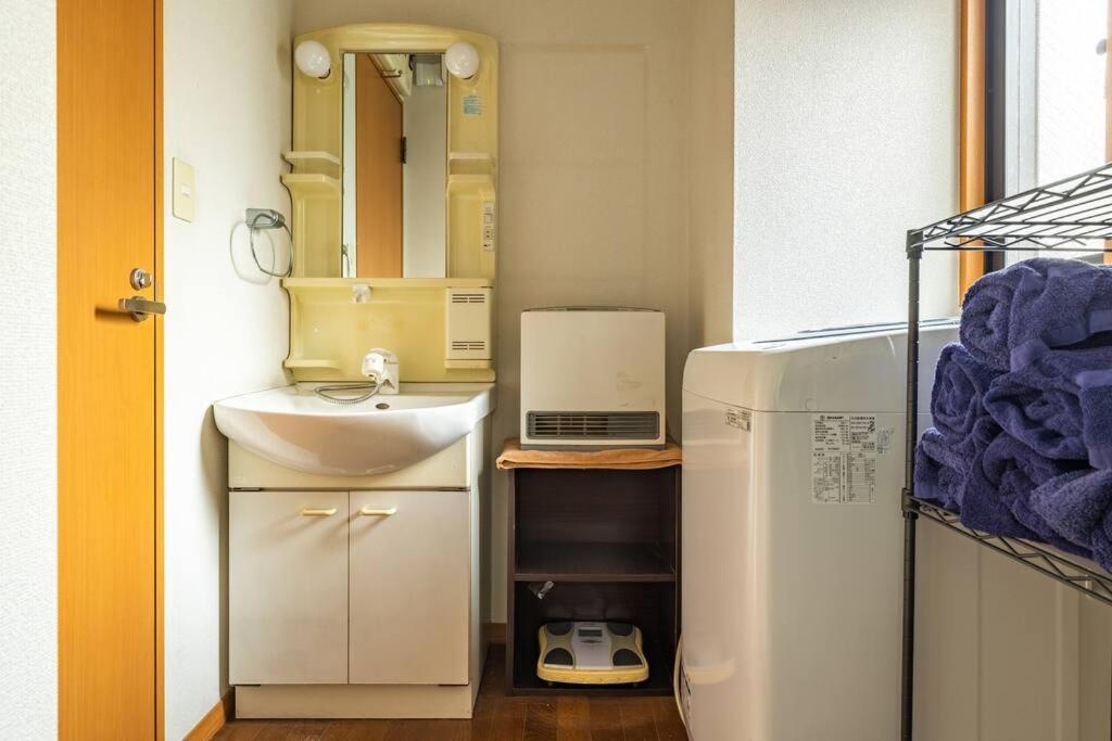 アンドステイ西新井 Apartamento
