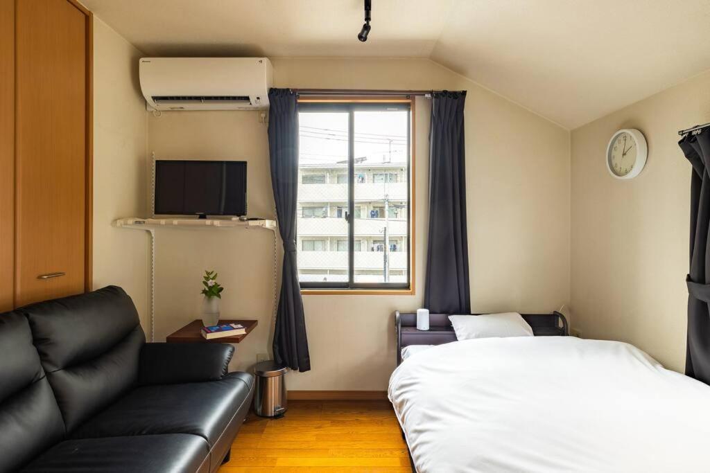 アンドステイ西新井 Apartamento